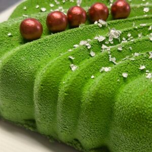 Bûchette création — Pistache, crémeux citron-safran